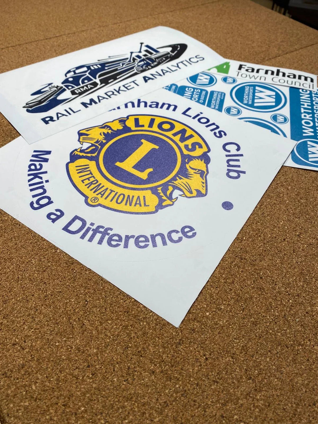 Custom printed vinyl stickers for marine and watersports, UK made, logo designs on cork.